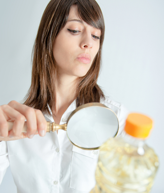 woman reading label