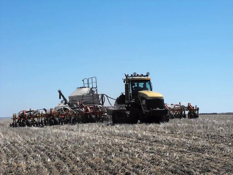 Figure 16. No-till seeding into a Fargo silty clay soil southwest of Bottineau, N.D. 