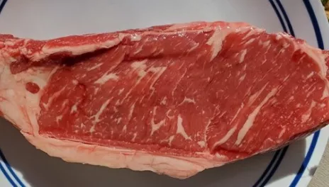 Well-marbled ribeye steak