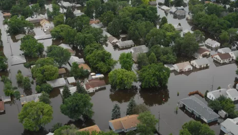 Aerieal view of a neighborhood overwhelmed by floodwaters