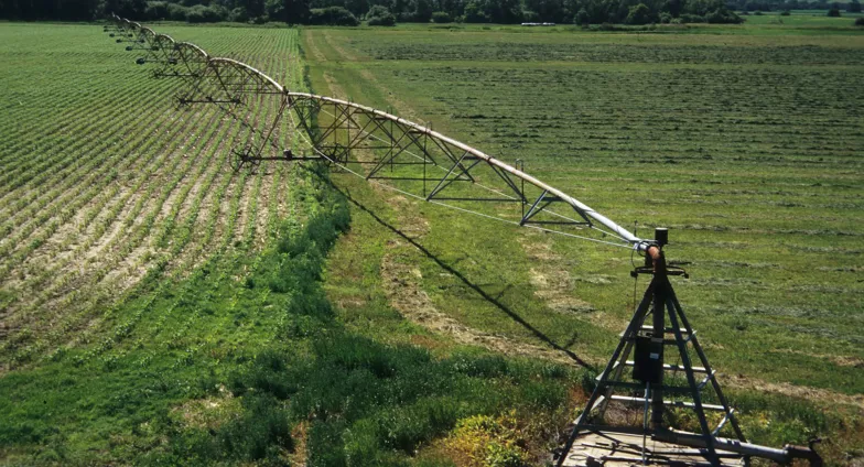 irrigation sprayer on center pivot in field