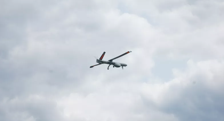 flying drone on cloudy day