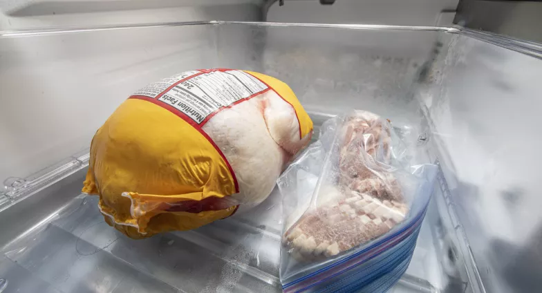 frozen poultry and bacon in  freezer