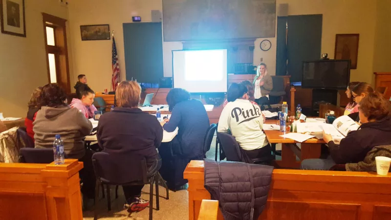 women learning in a class