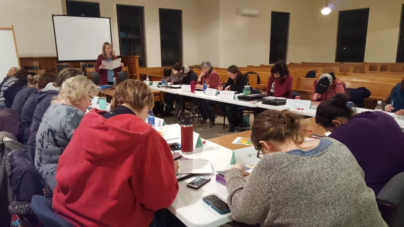 women learning in a class