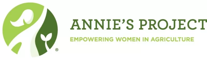 A green logo of a woman and seedling silhoutte reads" Annie's Project Empowering Women in Agriculture"