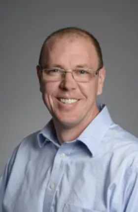 Headshot of Dr. Aaron Ericsson