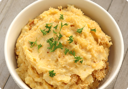 A bowl of mashed potato and rutabaga
