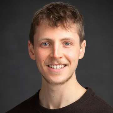 Headshot of Micah Gartenberg