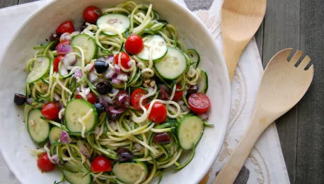 Greek Zoodle Salad, prepared and served in a dish