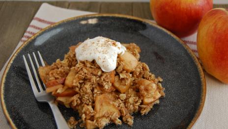 Slow Cooker Harvest Apple Crisp, served with whipped cream