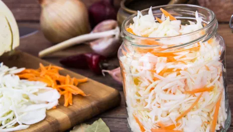 jar of cabbage and carrots ready to ferment