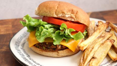 black bean burger with lettuce and tomato and french fries
