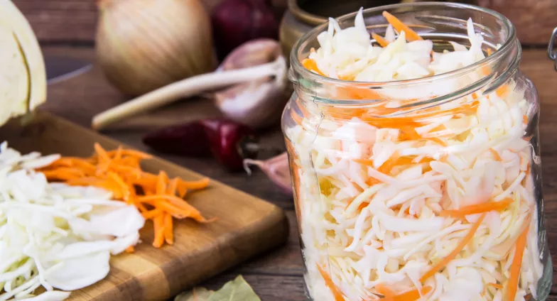 jar of cabbage and carrots ready to ferment