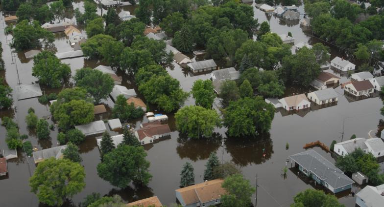 Aerieal view of a neighborhood overwhelmed by floodwaters