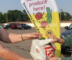 bag of produce being donated